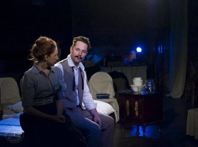 Julie Baber (Olga) and Adam Bradley (Kulygin) in Hivemind Theatre's production of Three Sisters